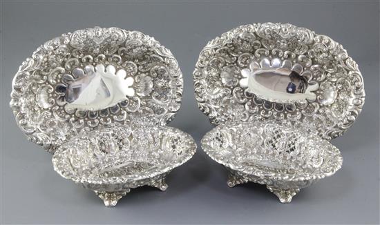 A matched set of four Victorian embossed silver dishes (two pairs), by Horace Woodward & Co/ Ltd, length largest 245mm, weight 56oz